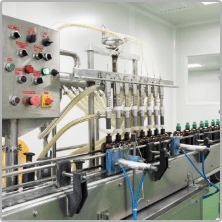 Automatic liquid filling line with control panel in B Block