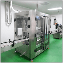 Automatic filling and capping machine on the ground floor line