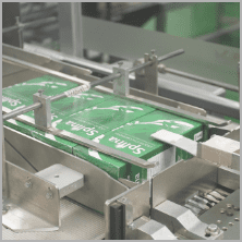 Splina cartons moving along the packing conveyor
