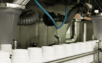 Automatic filling machine dosing product into white containers
