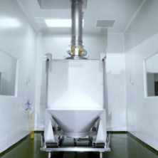 Gravity discharge hopper feeding product between cleanroom floors