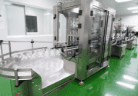 Personal care bottles on the automated filling line at Edmark Industries