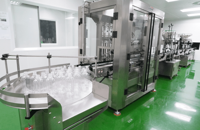 Personal care bottles on the automated filling line at Edmark Industries