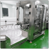 Personal care bottles on the automated filling line at Edmark Industries