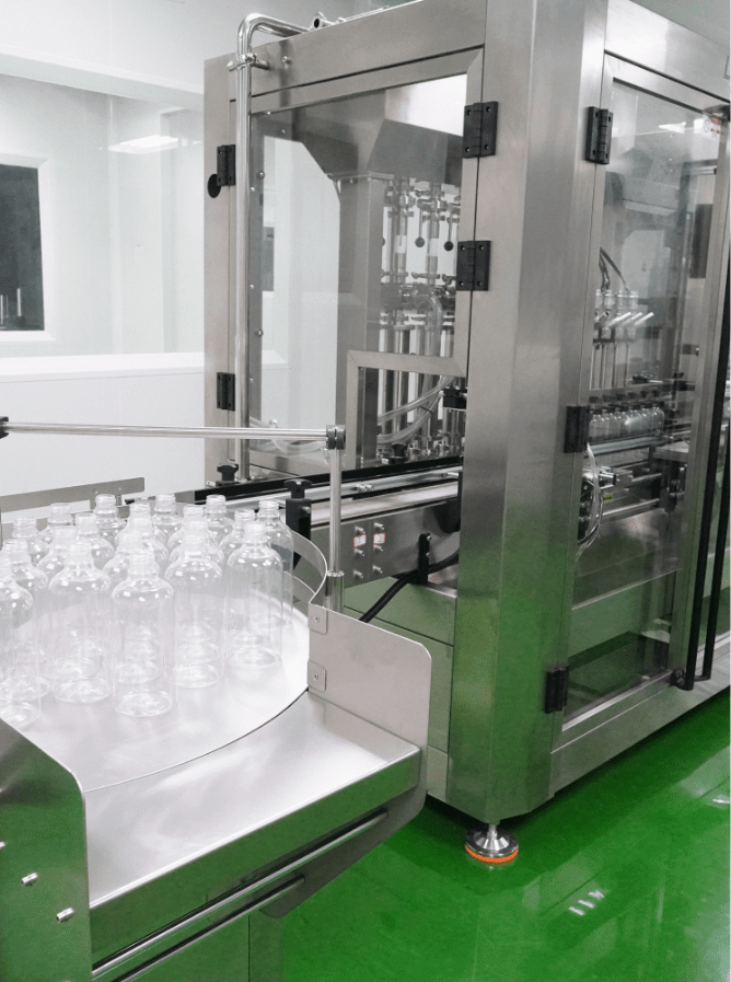 Personal care bottles on the automated filling line at Edmark Industries