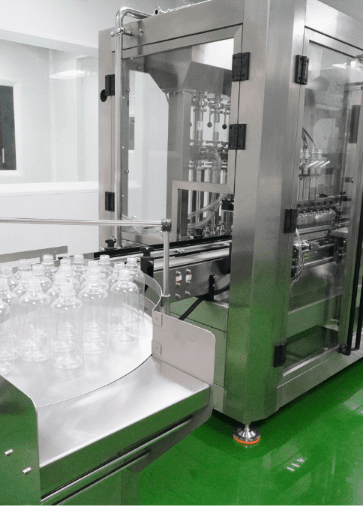 Personal care bottles on the automated filling line at Edmark Industries