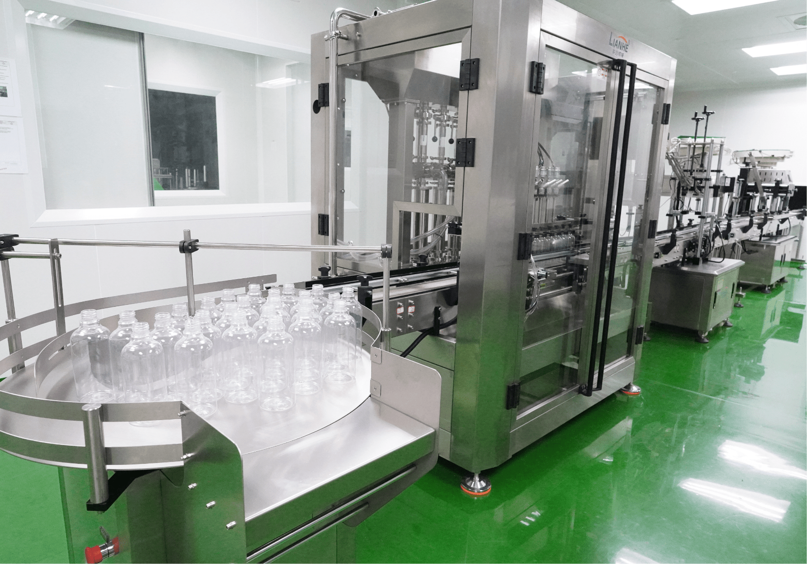 Personal care bottles on the automated filling line at Edmark Industries
