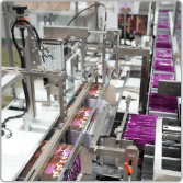 Multi-lane machine producing filled drink sachets