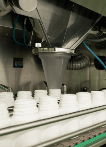 Powder dosing funnels filling supplement canisters
