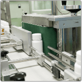 Supplement bottles on the automated filling and packing line