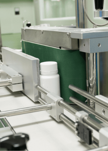 Supplement bottles on the automated filling and packing line
