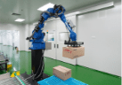 Robotic palletizing arm stacking packed cartons