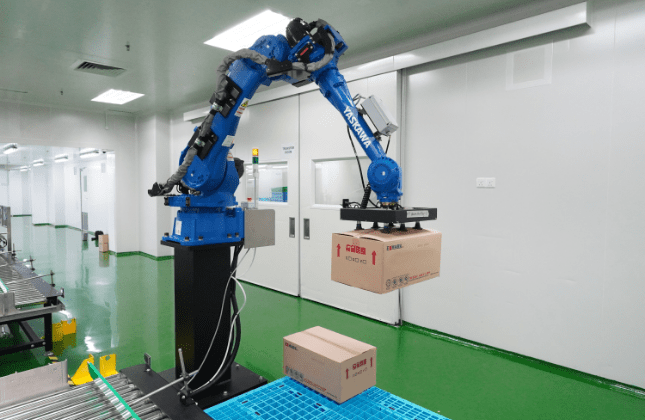 Robotic palletizing arm stacking packed cartons