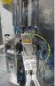 Capsule feed channel on the filling machine