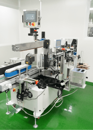 Labelling machine on the personal care packing line