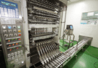 Multi-lane stick-pack machine filling powder sachets