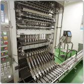 Multi-lane stick-pack machine filling powder sachets