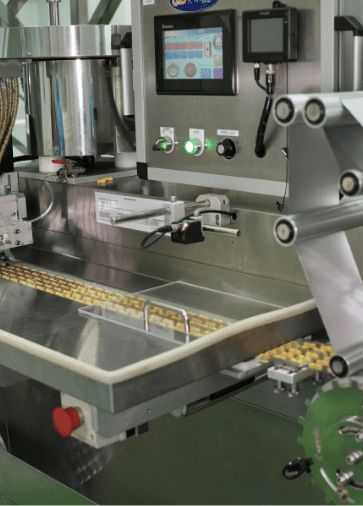 Softgel capsules on the inspection tray of the encapsulation machine