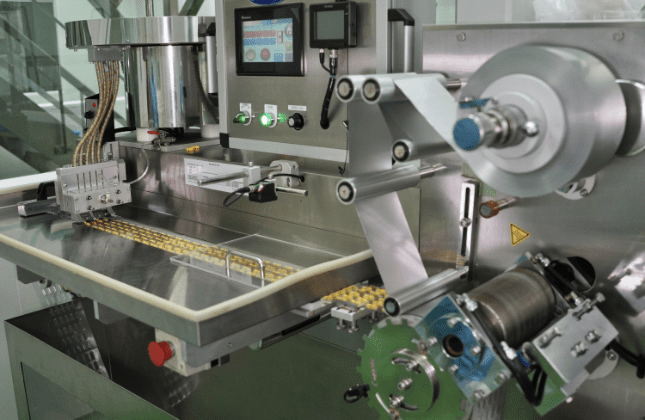 Softgel capsules on the inspection tray of the encapsulation machine