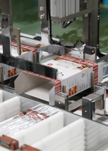 Folded cartons in the cartoning machine magazine