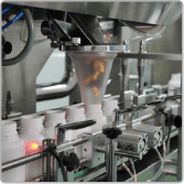 Capsule counting machine dosing capsules into bottles