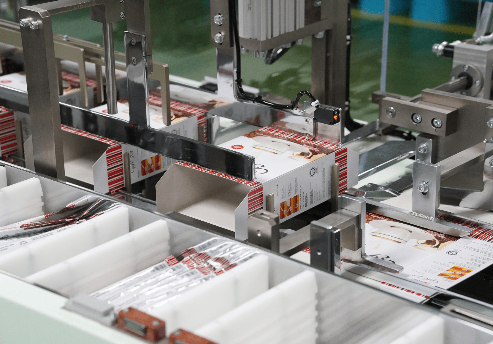 Folded cartons in the cartoning machine magazine