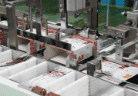 Folded cartons in the cartoning machine magazine