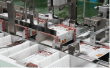 Folded cartons in the cartoning machine magazine