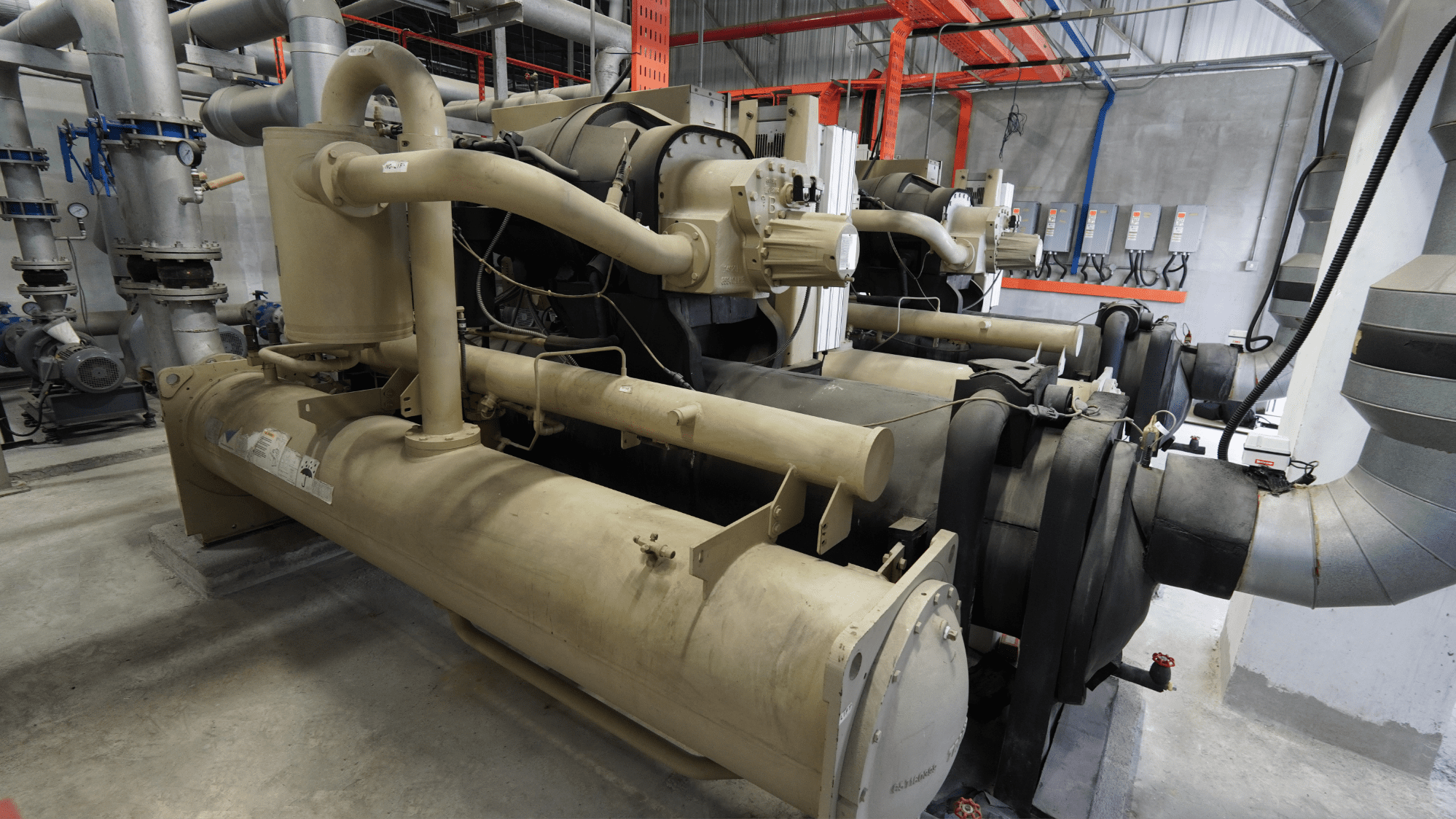 Insulated chilled water pipework and valves in the plant room at Edmark Industries