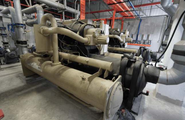 Insulated chilled water pipework and valves in the plant room at Edmark Industries