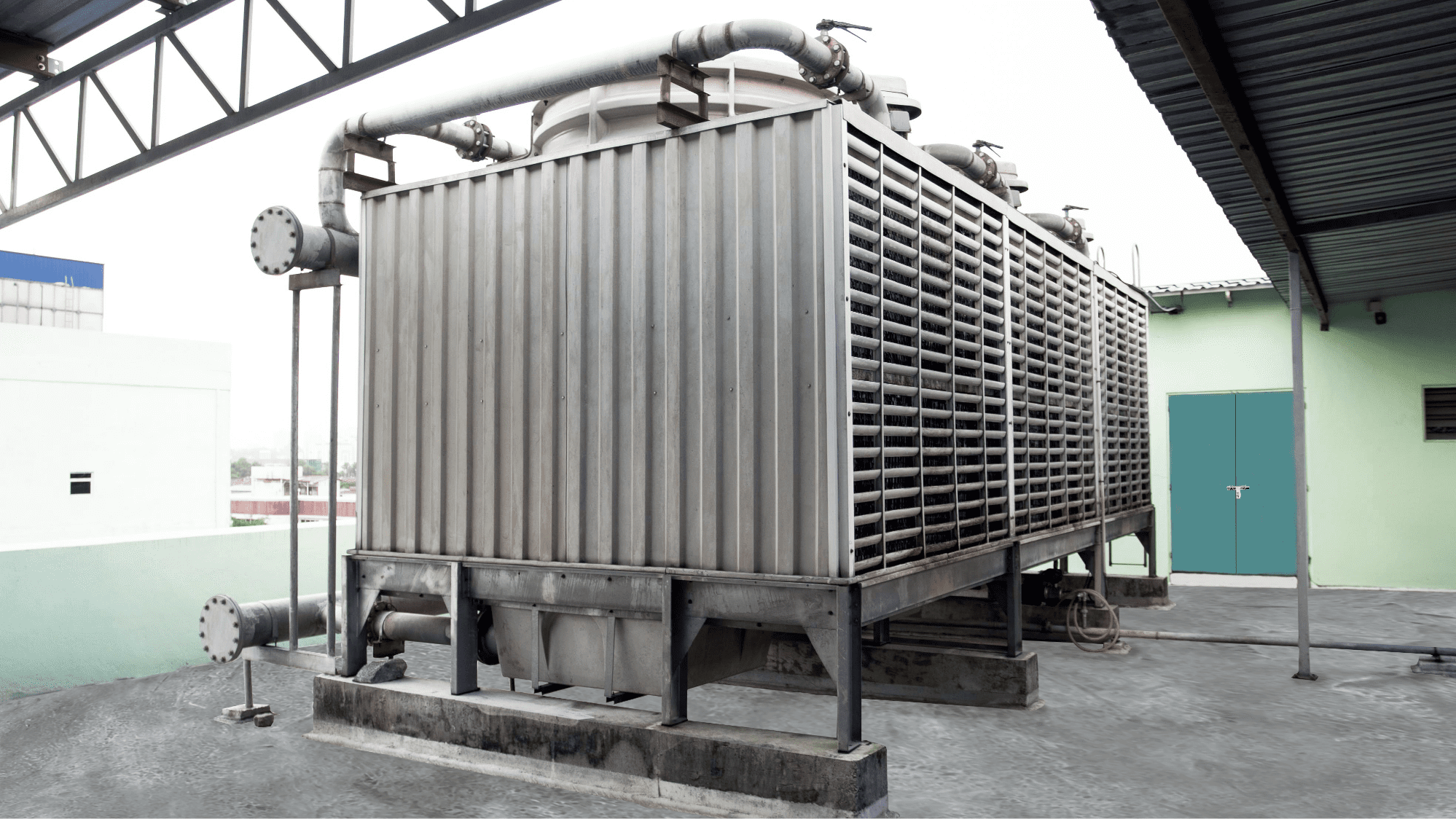 Water-cooled cooling tower serving the HVAC chiller system at the Edmark Industries factory