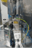 Operator working at the high-speed packing line at Edmark Industries