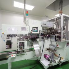 Automated packaging and cartoning machine on the production line at Edmark Industries facility