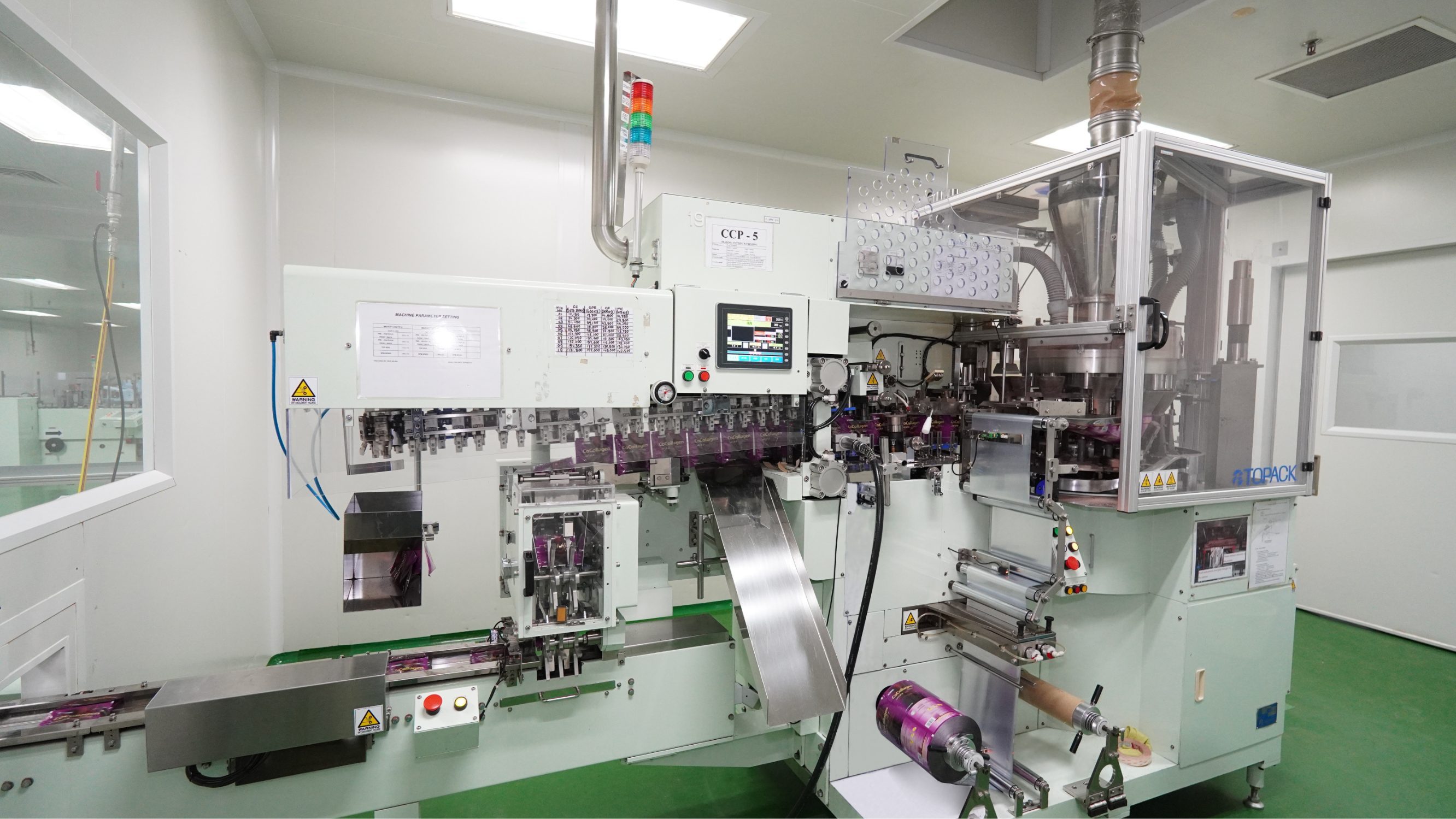 Automated packaging and cartoning machine on the production line at Edmark Industries facility